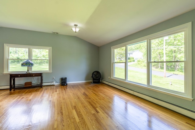 55 Linton St, Torrington, CT 06790 - spare room featuring a baseboard heating unit, wood finished floors, vaulted ceiling, and baseboards