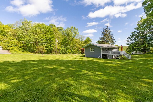 55 Linton St, Torrington, CT 06790 - view of green lawn with stairs and a wooden deck