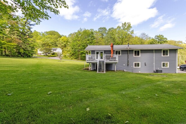 55 Linton St, Torrington, CT 06790 - back of house featuring central AC unit, a lawn, and a wooden deck