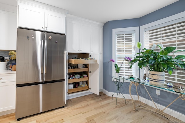 21 Summer Brook Way, Seymour, CT 06483 - kitchen featuring freestanding refrigerator, light wood-style floors, white cabinets, light countertops, and baseboards
