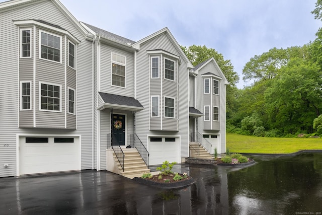 21 Summer Brook Way, Seymour, CT 06483 - view of front of home with a garage, driveway, and roof with shingles