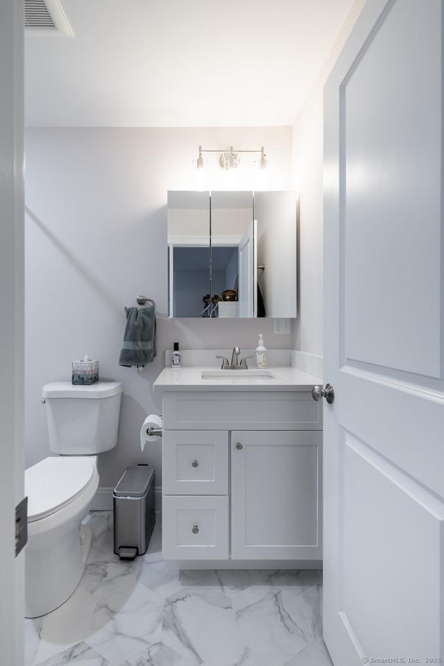 21 Summer Brook Way, Seymour, CT 06483 - half bath featuring marble look tile flooring, vanity, and toilet