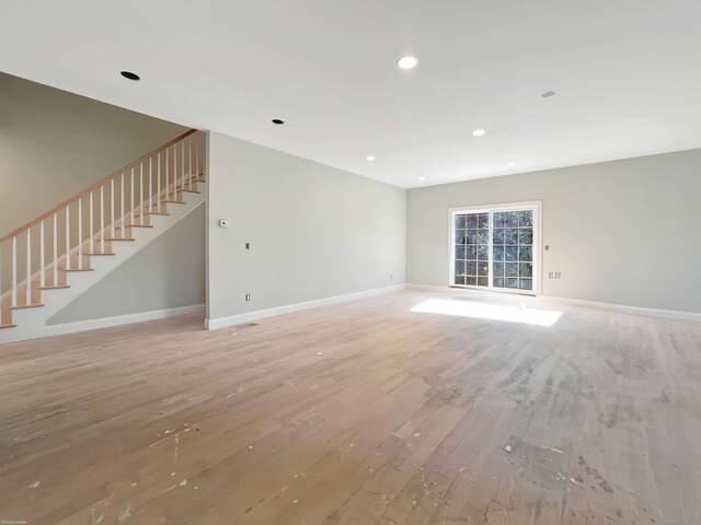 67 Fairfield Pl, Beacon Falls, CT 06403 - unfurnished living room with stairway, light wood-type flooring, baseboards, and recessed lighting