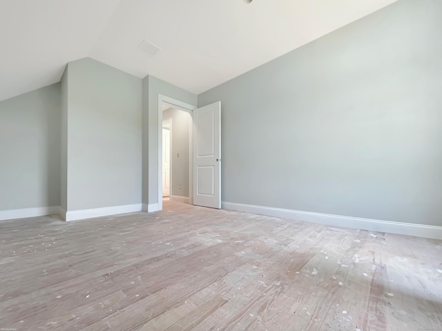 67 Fairfield Pl, Beacon Falls, CT 06403 - bonus room featuring light wood-style flooring, lofted ceiling, and baseboards