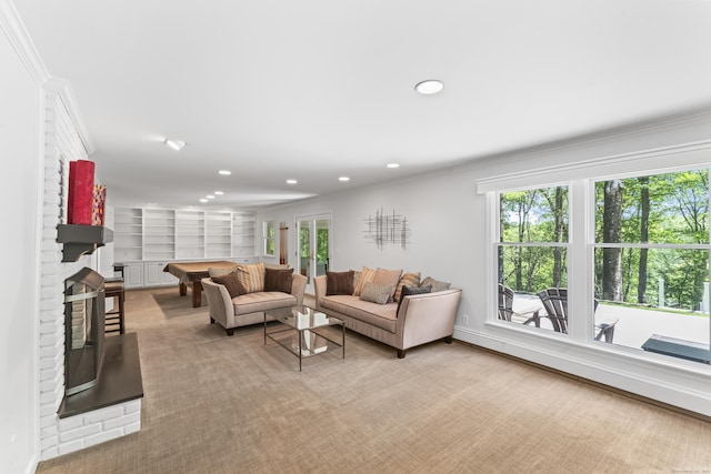53 Pinnacle Rock Rd, Stamford, CT 06903 - living room featuring ornamental molding, recessed lighting, a fireplace, baseboards, and light carpet