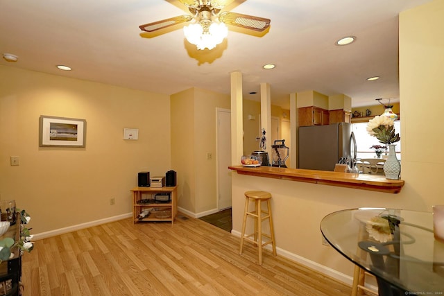 62 Deer Run Unit 62, Bethel, CT 06801 - kitchen featuring freestanding refrigerator, wood finished floors, baseboards, ceiling fan, and recessed lighting