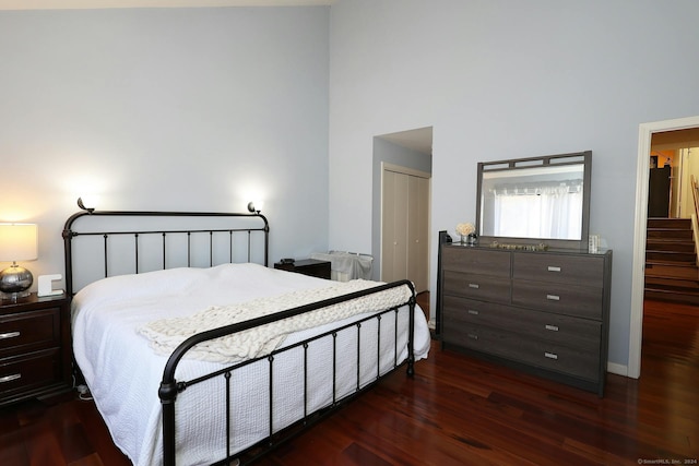 62 Deer Run Unit 62, Bethel, CT 06801 - bedroom with a closet, dark wood-type flooring, and a towering ceiling
