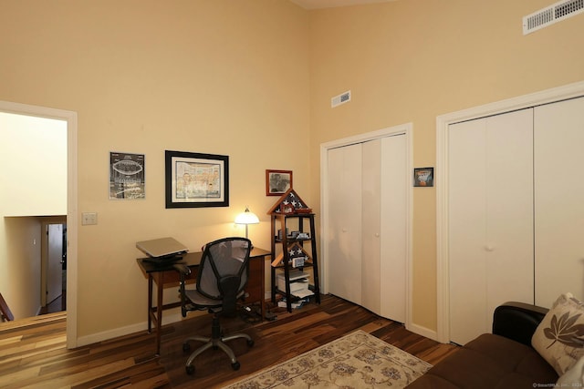 62 Deer Run Unit 62, Bethel, CT 06801 - office area featuring wood finished floors, a towering ceiling, and baseboards