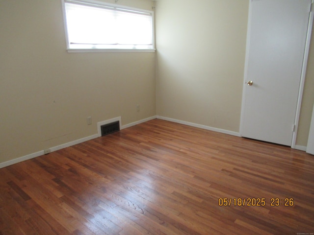37 Stepney Cir, Rocky Hill, CT 06067 - empty room with wood finished floors and baseboards
