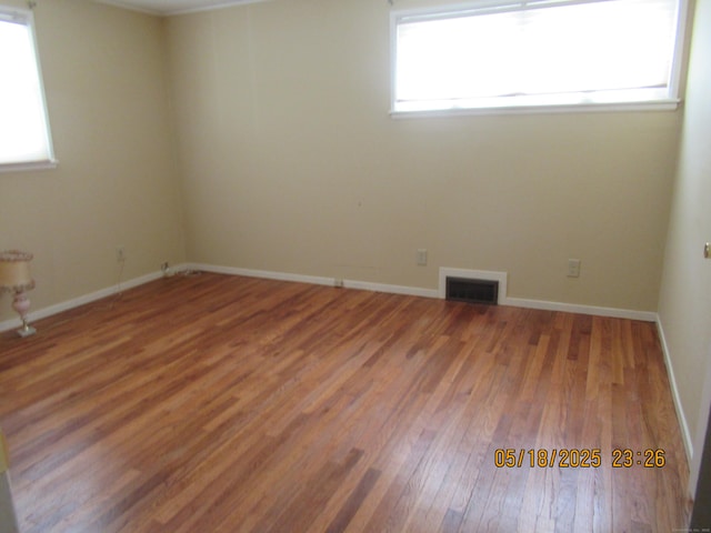 37 Stepney Cir, Rocky Hill, CT 06067 - unfurnished room with hardwood / wood-style flooring, plenty of natural light, and baseboards