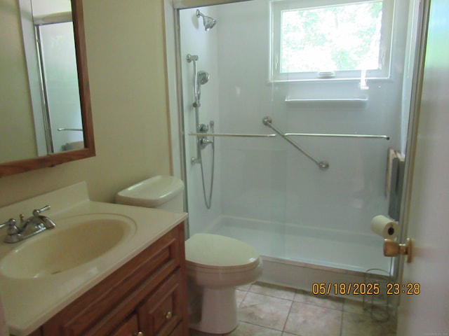 37 Stepney Cir, Rocky Hill, CT 06067 - full bath with toilet, a walk in shower, vanity, and tile patterned floors
