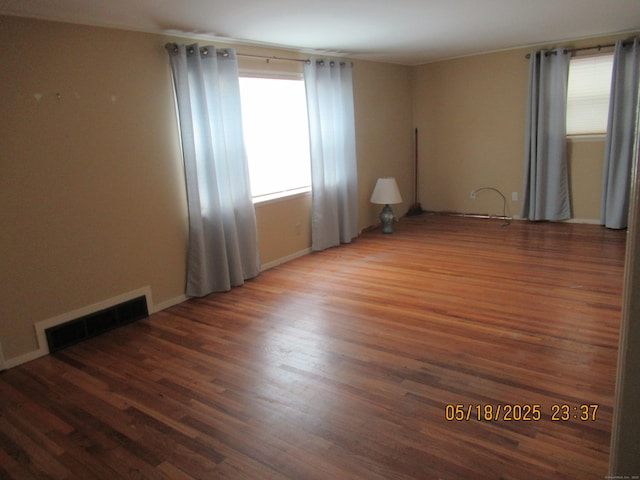 37 Stepney Cir, Rocky Hill, CT 06067 - empty room with wood finished floors and baseboards