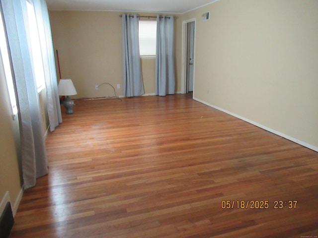 37 Stepney Cir, Rocky Hill, CT 06067 - empty room featuring wood finished floors and baseboards