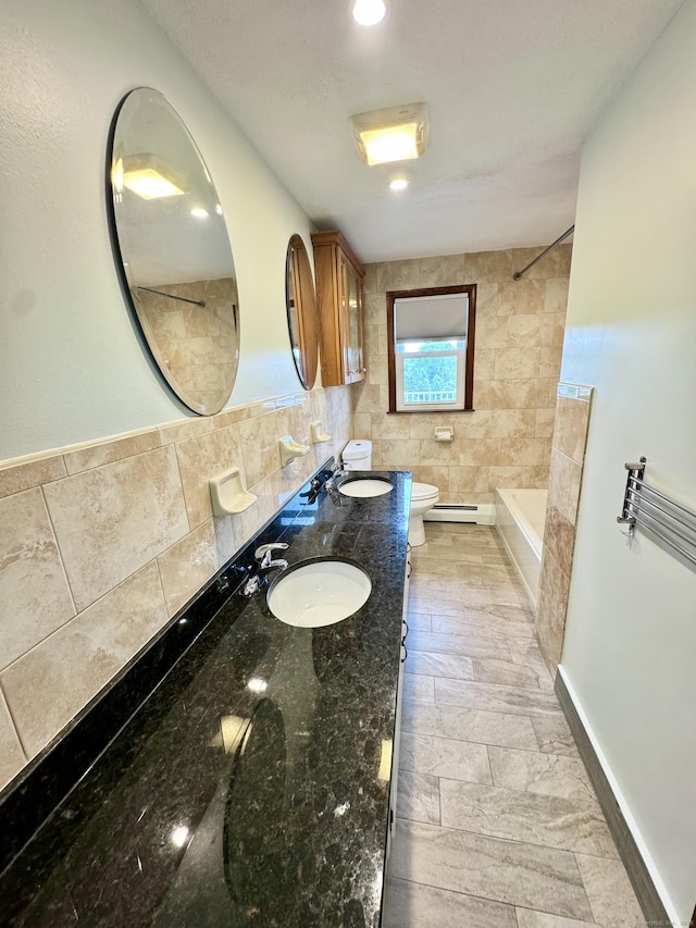 588 Poquonock Ave, Windsor, CT 06095 - bathroom with toilet, shower / washtub combination, tile walls, double vanity, and baseboard heating