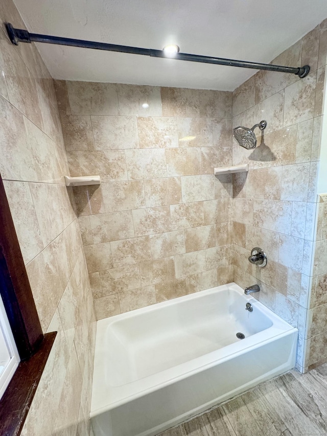 588 Poquonock Ave, Windsor, CT 06095 - full bathroom with wood finished floors and shower / washtub combination