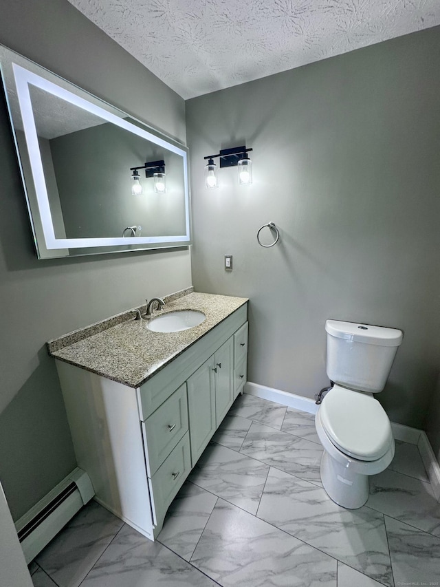 588 Poquonock Ave, Windsor, CT 06095 - bathroom featuring baseboard heating, marble finish floors, baseboards, vanity, and a textured ceiling