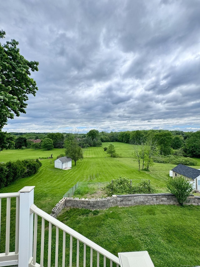 588 Poquonock Ave, Windsor, CT 06095 - view of green lawn with a rural view and an outbuilding