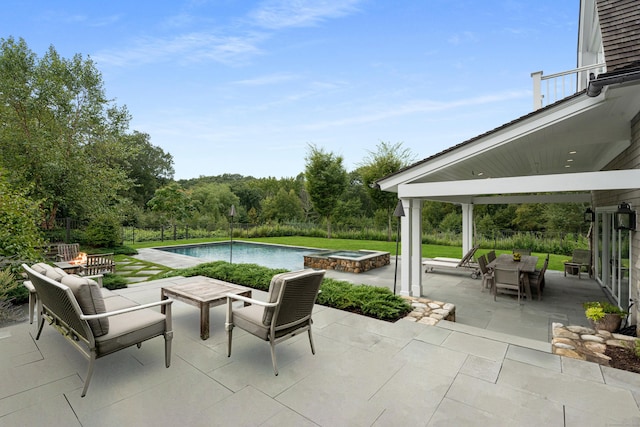 294 Maple Rd, Easton, CT 06612 - view of patio featuring outdoor dining area and a pool with connected hot tub