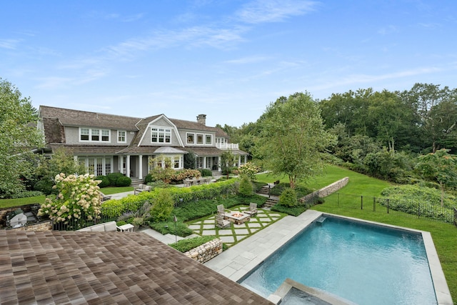 294 Maple Rd, Easton, CT 06612 - back of house featuring a chimney, a patio, and an outdoor pool