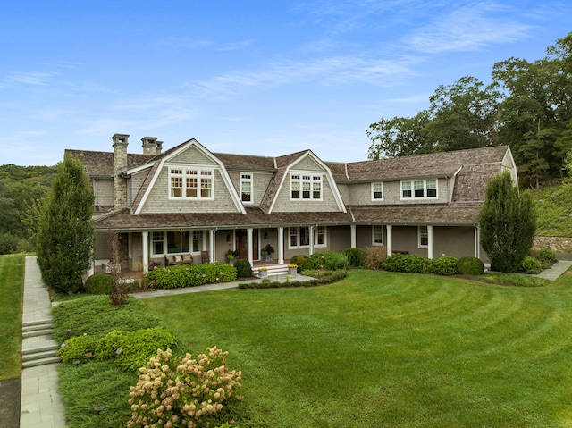 294 Maple Rd, Easton, CT 06612 - shingle-style home featuring a gambrel roof, a front lawn, and covered porch