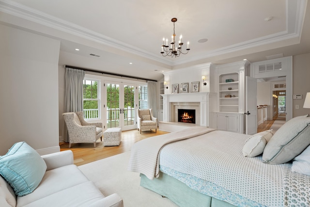 294 Maple Rd, Easton, CT 06612 - bedroom featuring a chandelier, access to exterior, crown molding, light wood-type flooring, and a tray ceiling