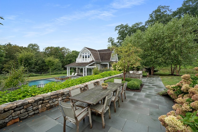 294 Maple Rd, Easton, CT 06612 - view of patio / terrace featuring outdoor dining area and a pool with connected hot tub