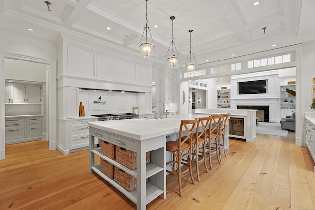 294 Maple Rd, Easton, CT 06612 - kitchen with coffered ceiling, recessed lighting, light wood-type flooring, white cabinetry, and beam ceiling
