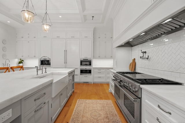 294 Maple Rd, Easton, CT 06612 - kitchen with range with two ovens, premium range hood, tasteful backsplash, pendant lighting, and white cabinets