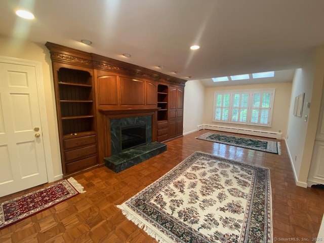 2 Tunxis Pl, Cheshire, CT 06410 - unfurnished living room featuring a baseboard radiator, a high end fireplace, recessed lighting, and baseboards