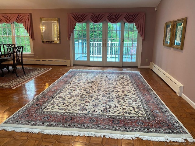 2 Tunxis Pl, Cheshire, CT 06410 - doorway to outside with a baseboard heating unit and baseboards