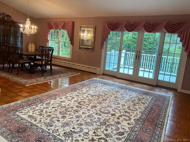 2 Tunxis Pl, Cheshire, CT 06410 - dining room featuring baseboard heating, a chandelier, baseboards, and lofted ceiling