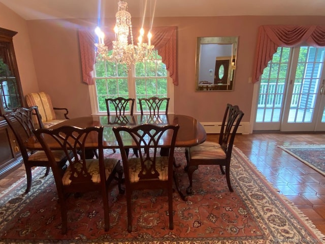2 Tunxis Pl, Cheshire, CT 06410 - dining room featuring a chandelier, baseboard heating, and baseboards