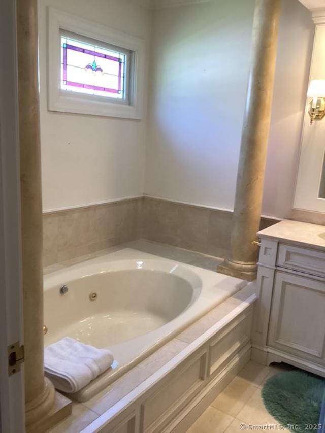 2 Tunxis Pl, Cheshire, CT 06410 - full bath featuring a jetted tub, tile patterned flooring, vanity, and decorative columns