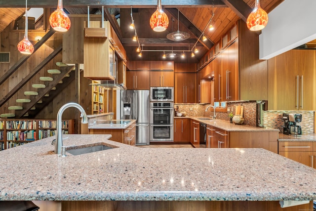 522 Peddlers Rd, Guilford, CT 06437 - kitchen featuring appliances with stainless steel finishes, brown cabinets, light stone countertops, and wooden ceiling
