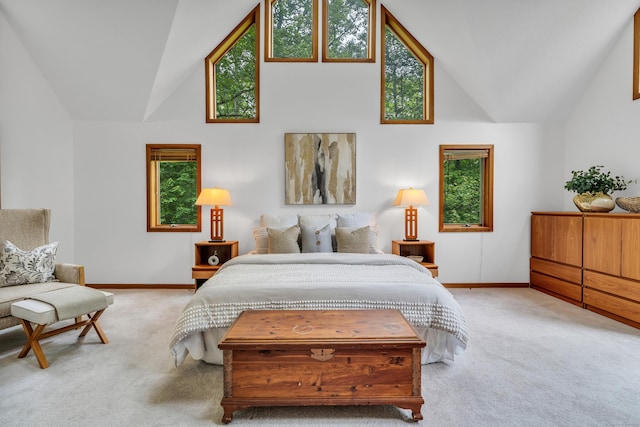 522 Peddlers Rd, Guilford, CT 06437 - carpeted bedroom featuring multiple windows and high vaulted ceiling