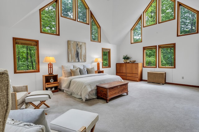 522 Peddlers Rd, Guilford, CT 06437 - carpeted bedroom featuring high vaulted ceiling and multiple windows