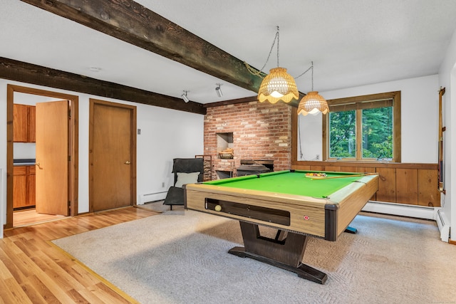 522 Peddlers Rd, Guilford, CT 06437 - game room with a baseboard heating unit, beamed ceiling, wood finished floors, a fireplace, and billiards