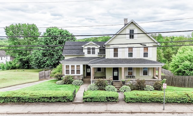 153 Prospect St, Plainfield, CT 06354 - view of front facade featuring a porch, a shingled roof, stone siding, and a chimney