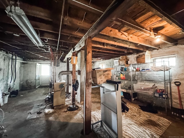 153 Prospect St, Plainfield, CT 06354 - below grade area with a heating unit