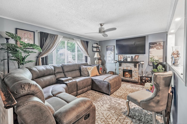 66 Coleman St, West Haven, CT 06516 - living area with a textured ceiling, a ceiling fan, crown molding, and a stone fireplace