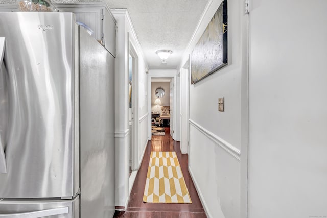 66 Coleman St, West Haven, CT 06516 - corridor featuring wood finished floors, a textured ceiling, and ornamental molding