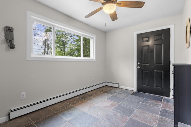 179 Carey Ave, Meriden, CT 06451 - foyer featuring a baseboard heating unit, stone tile floors, baseboards, and a ceiling fan