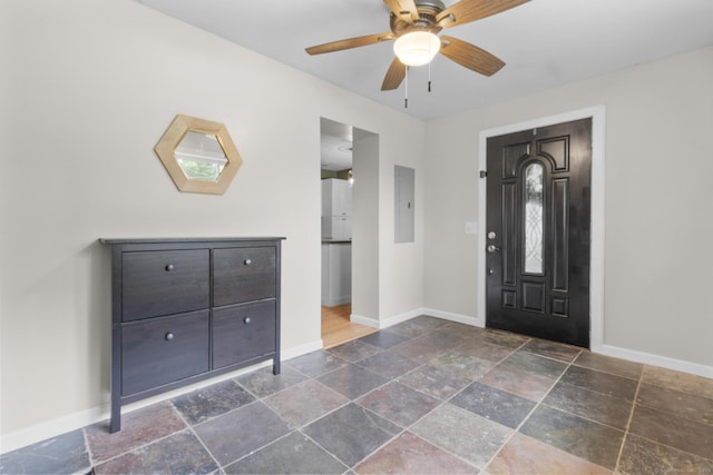 179 Carey Ave, Meriden, CT 06451 - entryway featuring stone tile flooring, baseboards, electric panel, and ceiling fan