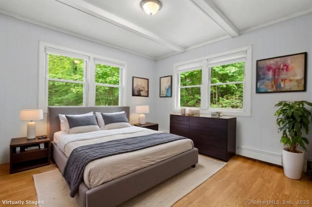 179 Carey Ave, Meriden, CT 06451 - bedroom featuring beam ceiling, light wood finished floors, and baseboard heating