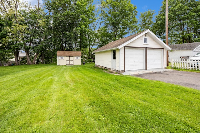 48 Burlington Ave, Bristol, CT 06010 - view of yard with a detached garage