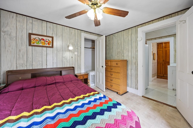 48 Burlington Ave, Bristol, CT 06010 - bedroom with wooden walls, a closet, and ceiling fan