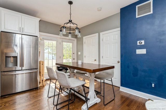 50 Almira Dr Unit B, Greenwich, CT 06831 - dining area with dark wood-style flooring and baseboards