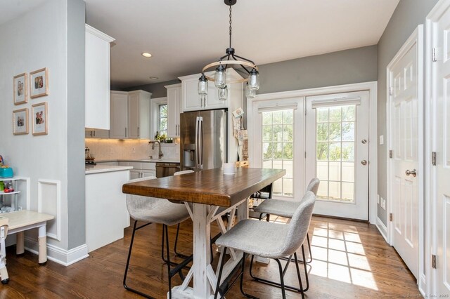 50 Almira Dr Unit B, Greenwich, CT 06831 - dining area featuring dark wood-style floors, recessed lighting, and baseboards