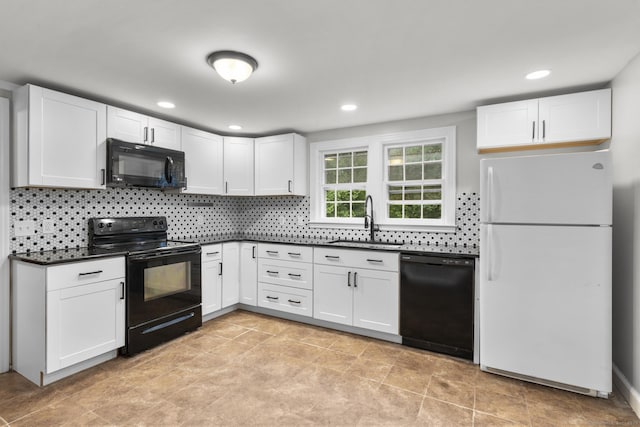 5 Brainerd Dr, Portland, CT 06480 - kitchen featuring black appliances, a sink, dark countertops, white cabinetry, and recessed lighting
