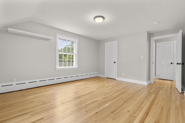 5 Brainerd Dr, Portland, CT 06480 - unfurnished room featuring a baseboard radiator, light wood finished floors, baseboards, and lofted ceiling